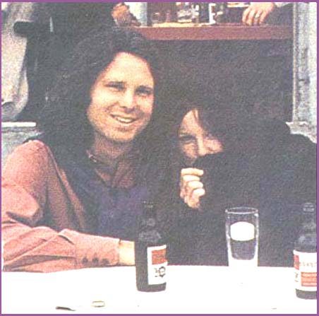 Jim Morrison & Pamela Courson relax at a cafe
